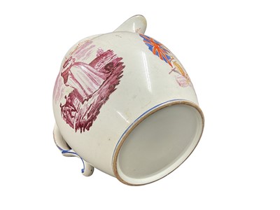 Lot 757 - Military interest- Georgian pearlware pottery jug with hand painted panel depicting military trophies and named 'R. H. Billings, music master, 55 regt.", 16cm in height.
