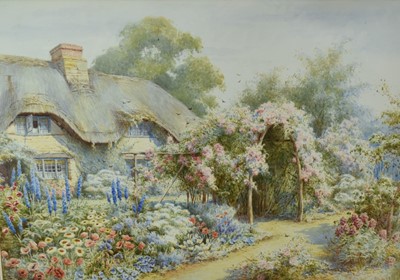 Lot 1268 - Maude Hollyer (1867-1910) watercolour - thatched cottage with rose arch and summer garden flowers, signed, 49cm x 71cm, in glazed gilt frame