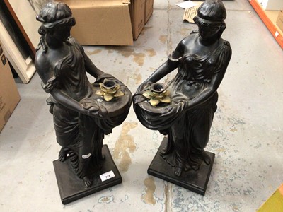 Lot 778 - Two classical ladies candle holders, 50 cm high