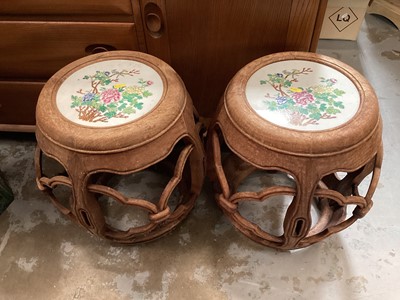 Lot 1466 - Pair of Chinese hardwood garden seats with inset porcelain tops