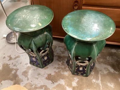 Lot 1467 - Pair of Chinese green and blue glazed stoneware garden seats with pierced decoration