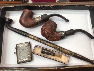 Lot 1134 - Silver vesta case, silver mount cheroot, two vintage pipes with silver collars and a Chinese opium pipe