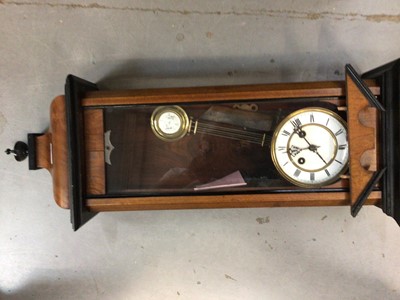 Lot 788 - A Vienna style regulator clock, pendulum and key