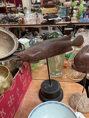 Lot 605 - Carved wooden model of a fish, raised on stand.