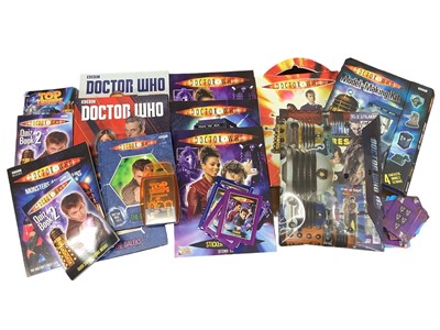 Lot 127 - Box of Doctor Who related items to include Sticker books, annuals and other items