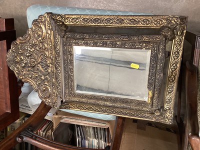 Lot 1484 - Bevelled wall mirror in ornate brass frame together with a circular convex mirror in gilt frame (2)