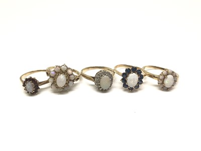 Lot 1146 - Five 9ct gold opal and gem set cluster rings