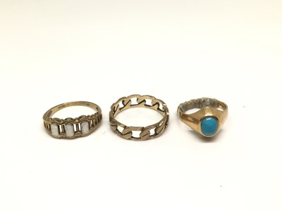 Lot 1147 - Two 9ct gold pierced band rings and a gold turquoise cabochon ring (3)