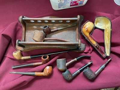 Lot 639 - Collection of mixed pipes, together with an oak pipe rack.