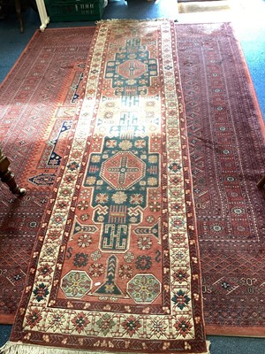 Lot 1504 - Eastern runner with two central medallions on pink, blue and cream ground, 314cm x 79cm