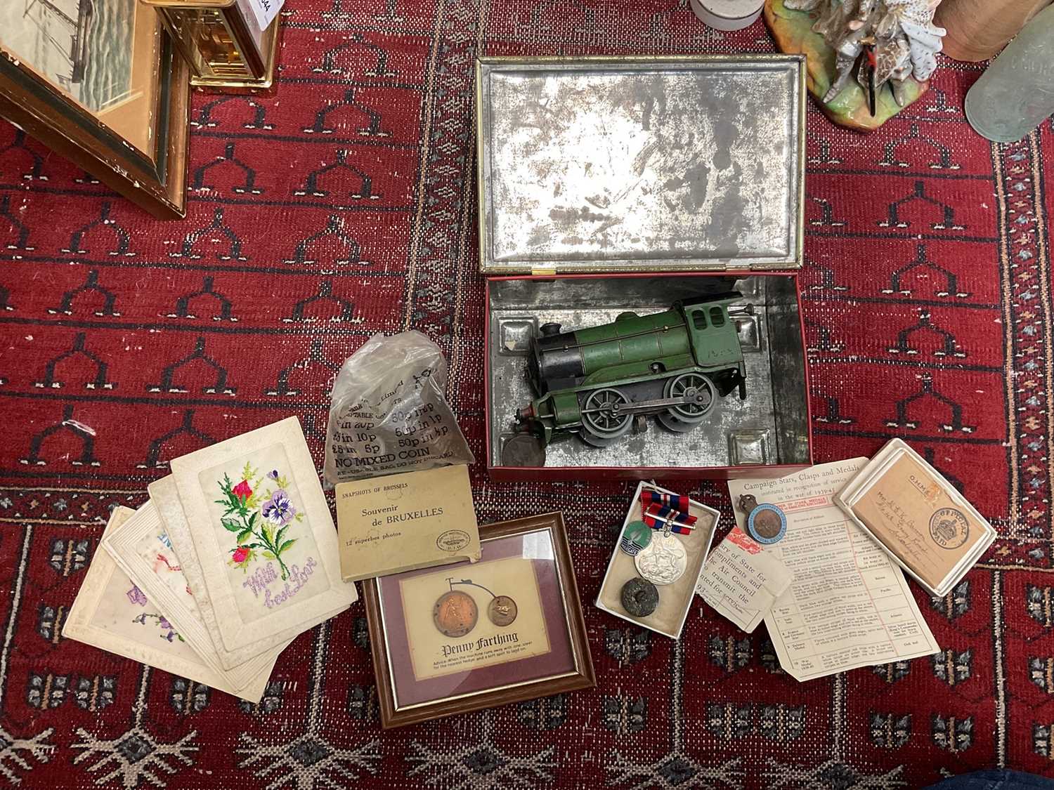 Lot 645 - Hornby tin plate train, Royal Observer Corps badge, Second World War War medal and other items.