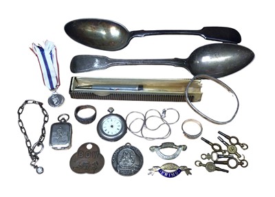 Lot 33 - Georgian silver tablespoon, one other plated spoon, silver cased fob watch, collection of winding keys, silver bangle, silver ring, other jewellery, badges and bijouterie