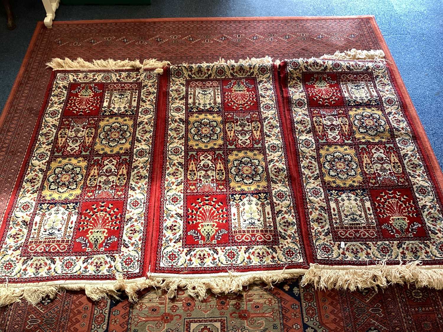 Lot 1505 - Eastern rug on red, blue and brown ground,