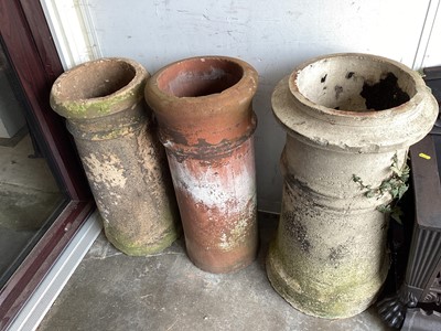 Lot 1510 - Three Victorian chimney pots, largest is 65cm high