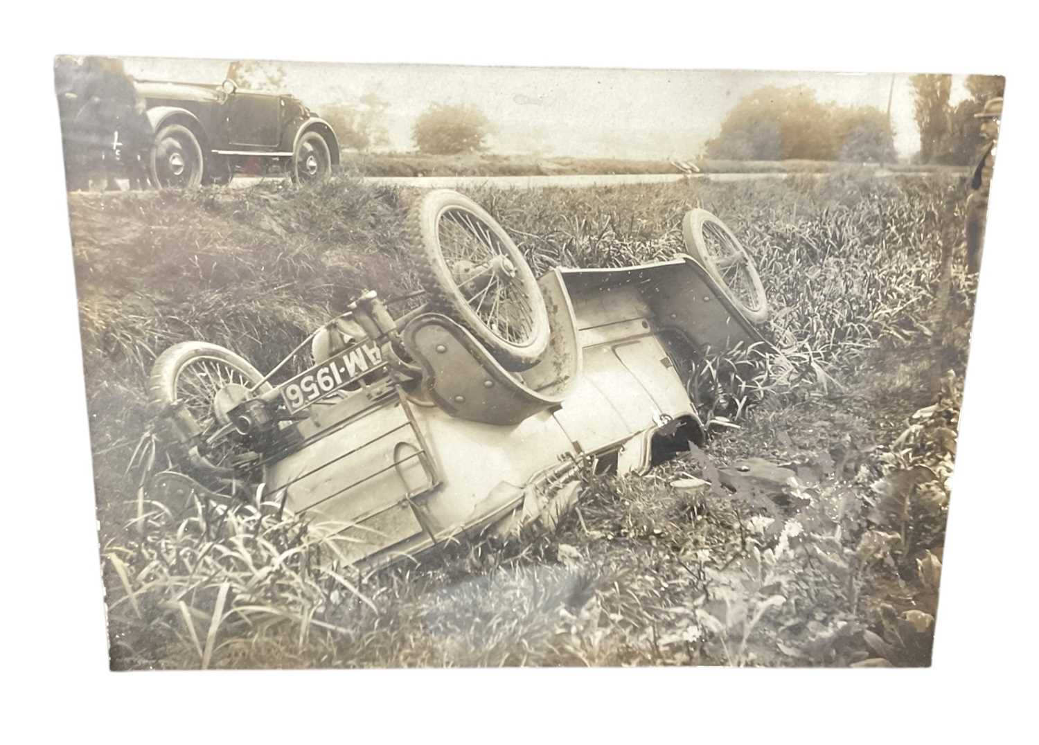 Lot 19 - Early motoring interest - 1920's photographs, newspaper cutting and related ephemera relating to a car crash, mounted in a glazed frame.