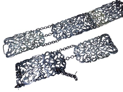 Lot 74 - Victorian silver panelled belt with pierced foliate scroll decoration