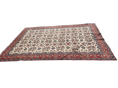 Lot 1580 - Good quality Heriz type rug with floral decoration on white, red and blue ground, 337cm x 250cm