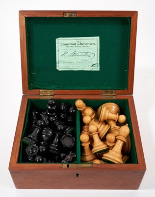 Lot 863 - Good antique boxwood chess set: J. Jaques & Son, Ltd., London 'The Staunton Chessmen', with weighted bases, 9cm high king, housed within a mahogany case with green baize lining