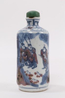 Lot 864 - Chinese blue and white porcelain snuff bottle, decorated with continuous figural frieze, green hardstone stopper and six character Yongzheng mark to base, 8cm higg