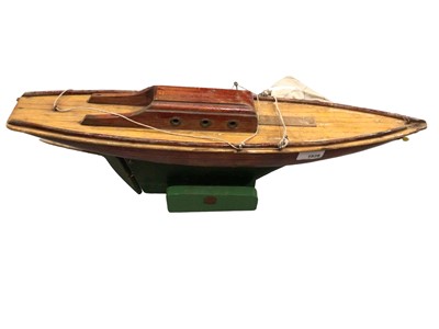 Lot 1828 - Wooden model yacht and stand.