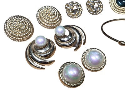 Lot 27 - Five pairs of 1980s gilt metal clip on earrings to include two pairs of Christian Dior simulated pearl earrings, two pairs by Monet and one pair by Leritz, together with a Michel Herbelin gold plat...