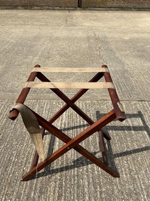Lot 63 - Edwardian oval mahogany two handled tray with shaped edge, on associated folding stand, tray 77cm x 57cm