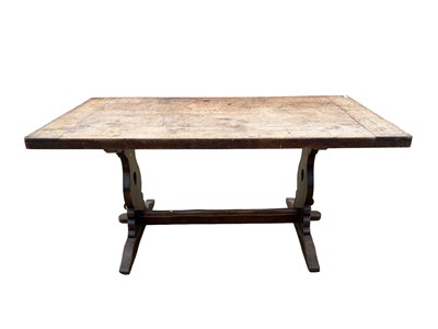 Lot 18 - Early 20th century oak refectory table, with plank top on trestle ends, 163 x 79cm