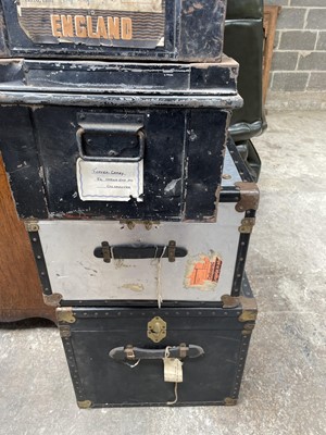 Lot 57 - Three early 20th century military tin trunks, together with two ther later trunks (5)