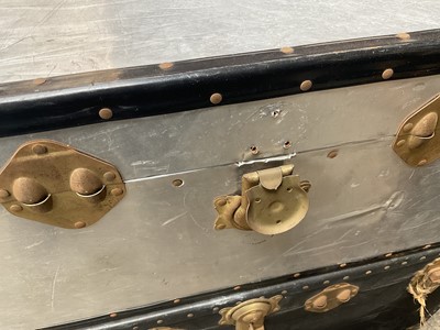 Lot 57 - Three early 20th century military tin trunks, together with two ther later trunks (5)