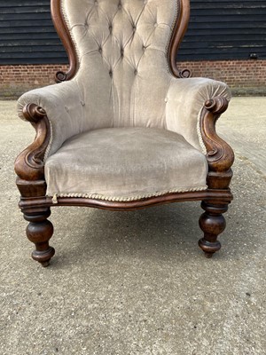 Lot 68 - Victorian mahogany framed buttoned back easy chair on turned legs