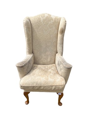 Lot 41 - Wing armchair, on shell carved cabriole legs