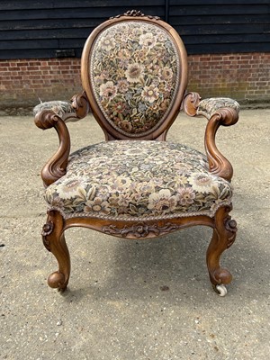Lot 49 - Victorian walnut open armchair