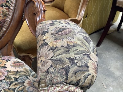 Lot 49 - Victorian walnut open armchair