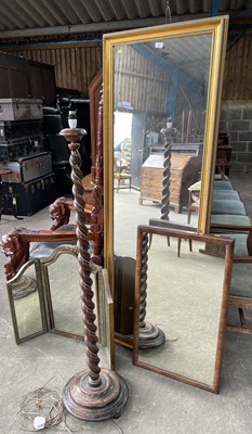 Lot 52 - Three various mirrors together with an oak standard lamp