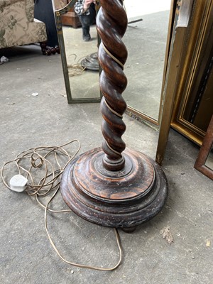 Lot 52 - Three various mirrors together with an oak standard lamp