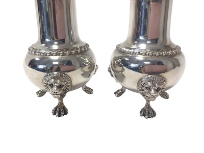 Lot 478 - Pair of 1930s silver sugar casters of baluster form on three lion mask and claw feet