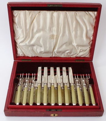 Lot 484 - Cased set of twelve Victorian silver dessert knives and forks, with ivorine handles, Sheffield 1897