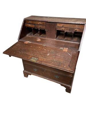 Lot 93 - George III oak bureau, with fitted interior and two short over three long graduated drawers on bracket feet, 93w x 51d x 110h