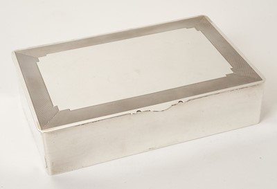 Lot 490 - 1930s silver cigarette box,of rectangular form by Mappin & Webb, Birmingham, 1937. 6.75 inches long