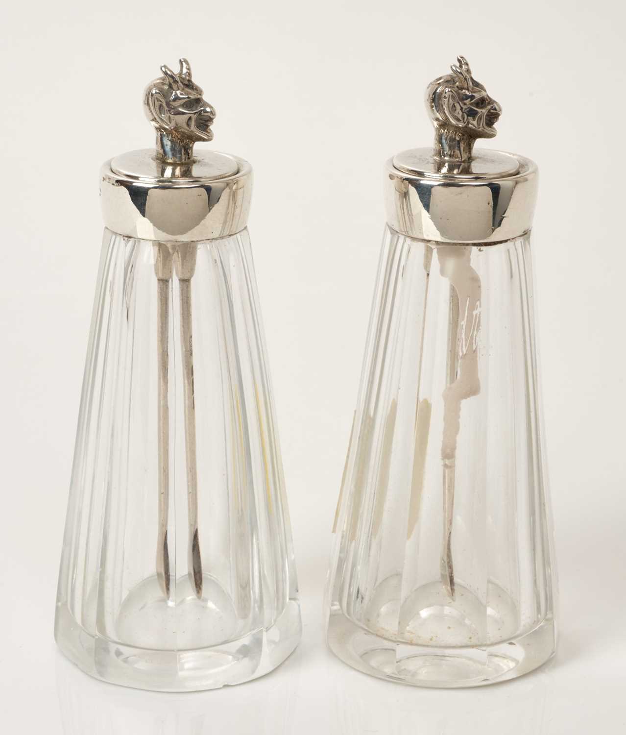 Lot 494 - Pair of silver mounted cut glass cayenne pepper bottles with silver spoons with devil’s head finials