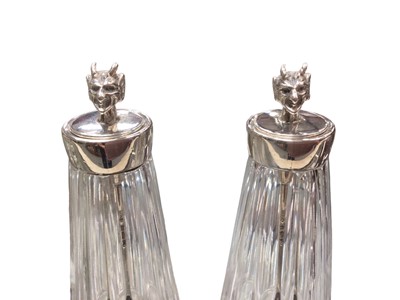 Lot 494 - Pair of silver mounted cut glass cayenne pepper bottles with silver spoons with devil’s head finials