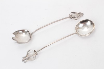 Lot 505 - Pair of 1940s Scottish Arts & Crafts style silver salad servers.