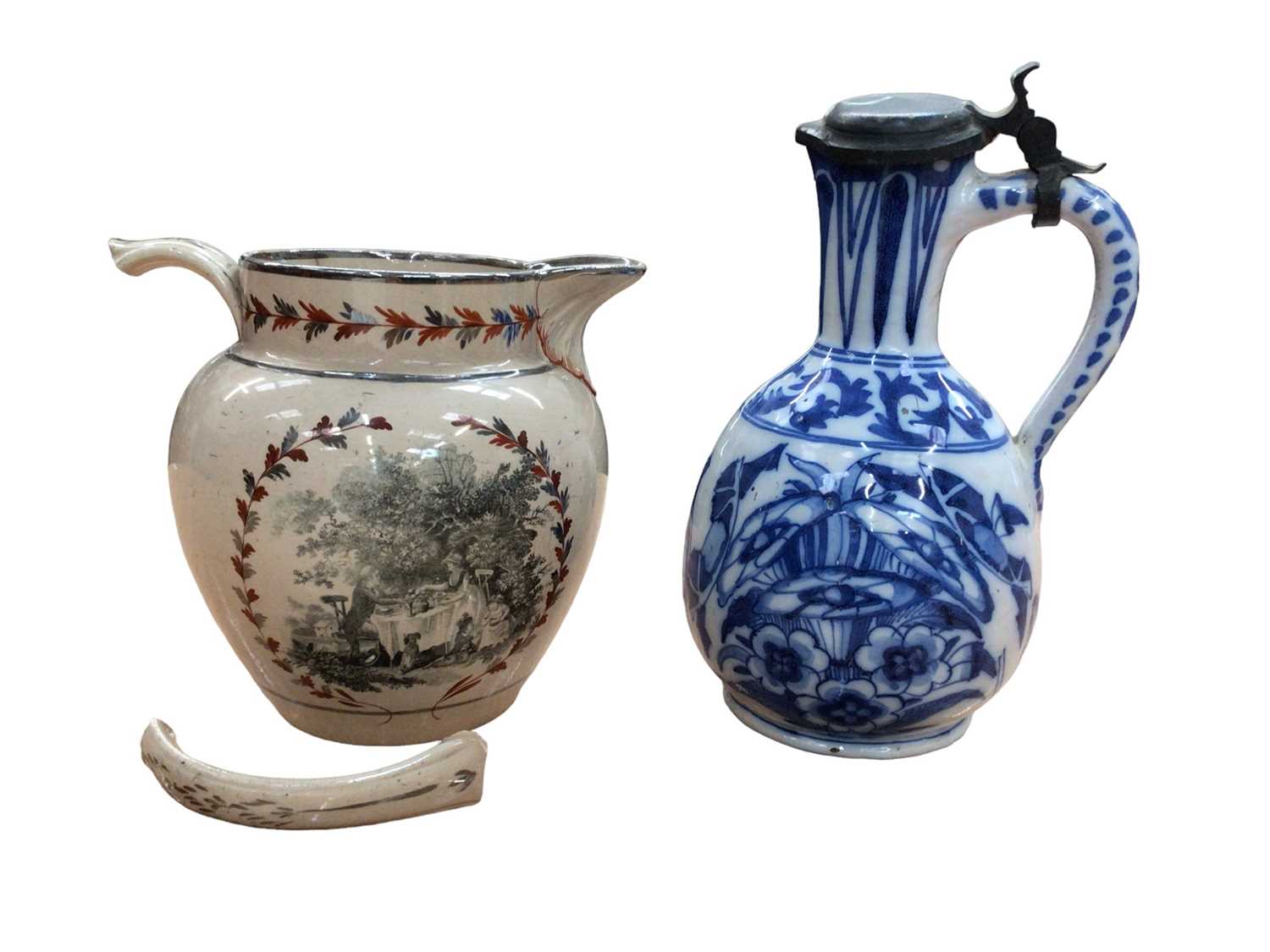 Lot 24 - Early 19th century English pottery jug, and a delft jug