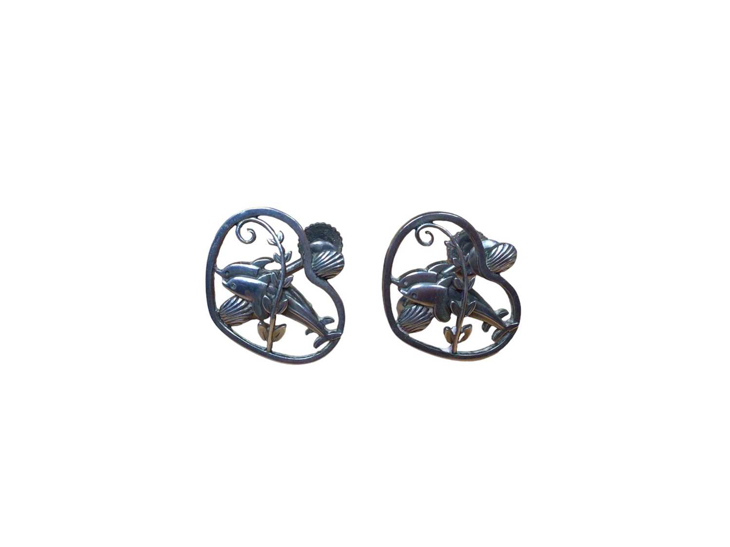 Lot 184 - Pair of Georg Jensen silver screw back earrings with double dolphin, leaf and shell decoration