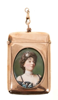 Lot 681 - Large and good quality Edwardian yellow metal vesta case with inset enamelled portrait miniature and armorial verso