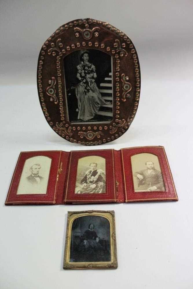 Lot 1576 - Three Edwardian photographs including of the Prince of Wales and Abraham Lincoln, a daguerreotype, photogrpah of Elizabeth II in copper frame, and a leather album