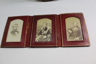 Lot 1576 - Three Edwardian photographs including of the Prince of Wales and Abraham Lincoln, a daguerreotype, photogrpah of Elizabeth II in copper frame, and a leather album