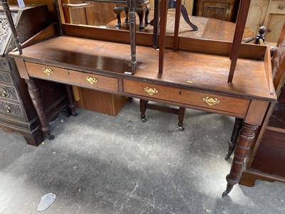 Lot 134 - Edwardian oak and mahogany hall table with ledge back above two drawers, on turned legs, 147cm wide