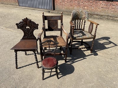 Lot 114 - Victorian carved oak hall chair, together with country caned oak open armchair, another open armchair and a correctional chair. (4)