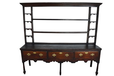 Lot 1491 - George III oak high dresser